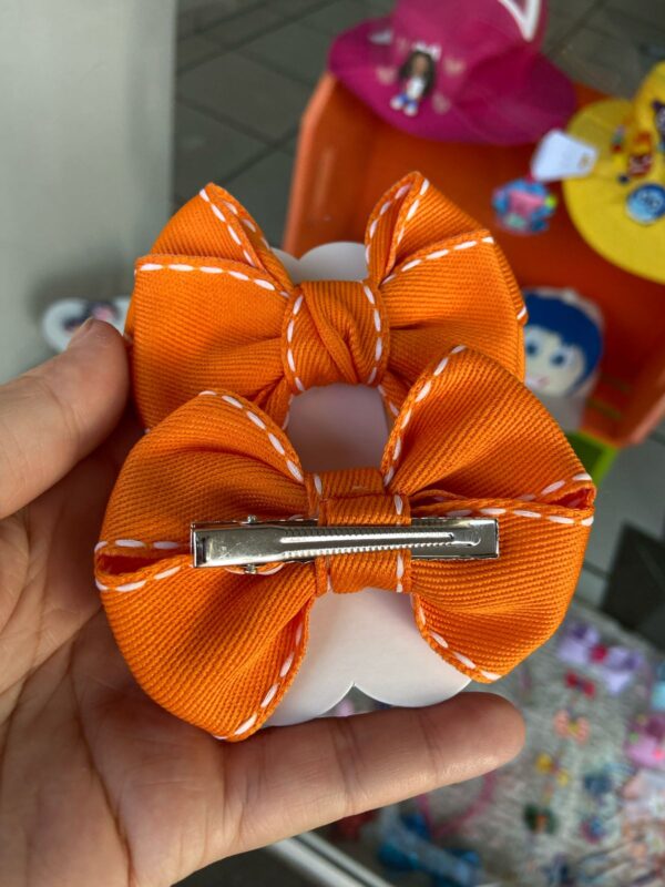 Par de Laços Laranja Infantil. - Imagem 2