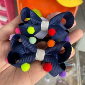 Par de Laços Azuis com Detalhes de Pompom