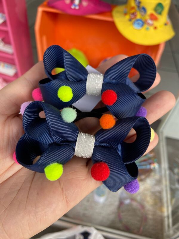Par de Laços Azuis com Detalhes de Pompom