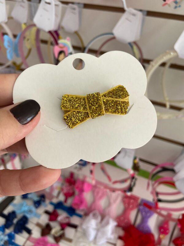 Mini Laço Dourado.