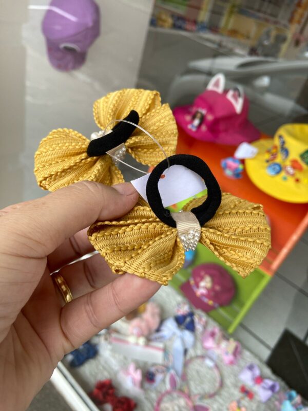 Par de Laços Dourado no Rabicó. - Imagem 2