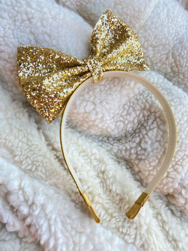 Tiara com Laço em Pé Dourado