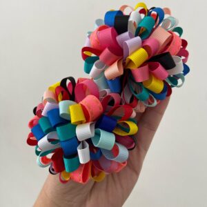 Par de Pompom Colorido com Presilha de Rabicó