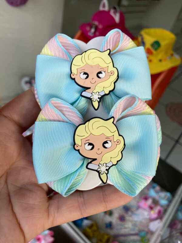 Par de Laços Azul com Aplique da Frozen.