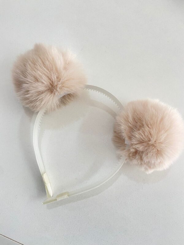 Tiara com pompom bege