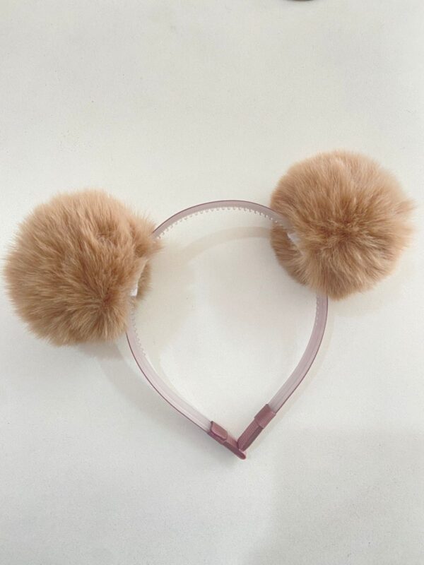 Tiara com pompom marrom